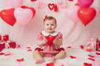 Mameluco burbuja rojo con rayas de corazón y lazos para San Valentín