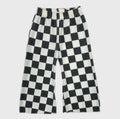 Pantalones de pernera ancha con estampado de tablero de ajedrez para niños